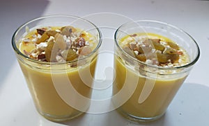 Two glasses of sweet mango juice