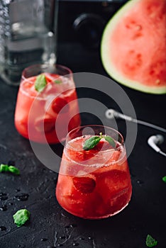 Two glasses of watermelon and strawberry cocktail