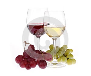 Two glasses of wine with grapes