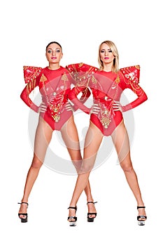 Two go-go dancers in red stage costume