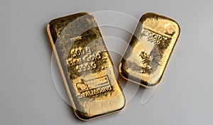 Two gold bars from different manufacturers weighing 500 grams each