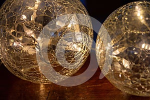 Two gold crackle effect Christmas glass ornaments or baubles