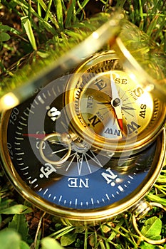 Two golden compasses