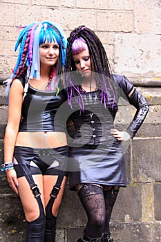 Two gothic girls wearing leather street style