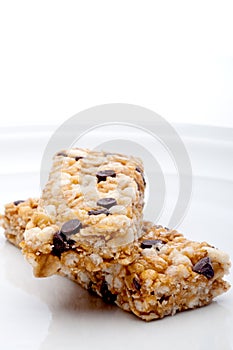 Two granola bars on a white plate