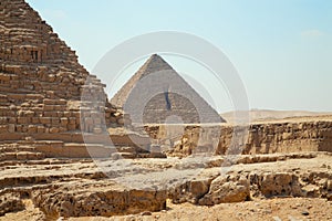 Two greatest Egypt pyramids in Giza, clouseup view on blue sky background with nobody