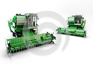 Two Green agricultural combine-harvesters