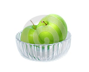 Two Green apple in Glass bowl on white background with water drop, fruit Nourish the health body