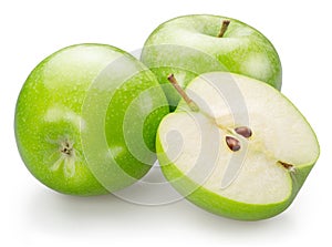 Two green apples and half of green apple on white background. File contains clipping path