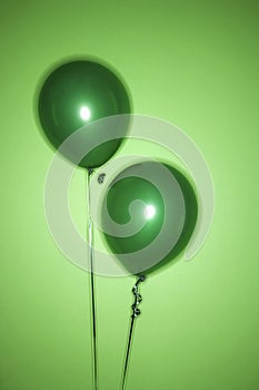 Two green balloons.