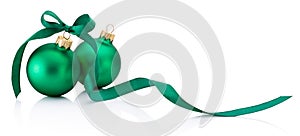 Two green Christmas baubles with ribbon bow isolated on white ba