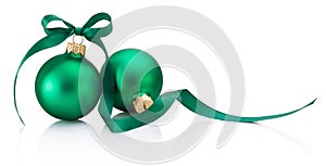 Two green Christmas baubles with ribbon bow isolated on white background