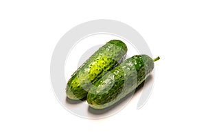 Two green cucumbers isolated on a white background