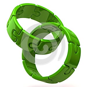 Two green puzzle rings