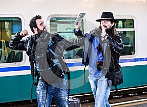 Two guys are fighting because they missed their train.