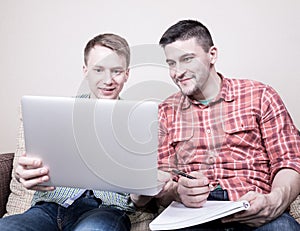 Two guys with gadgets