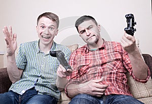 Two guys playing video games