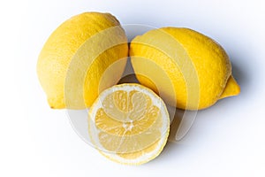 Two and a half lemons isolated on a white background