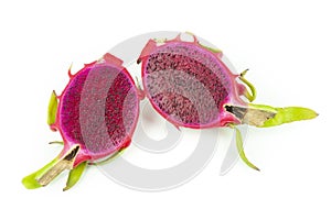 Two half sliced dragon fruit on white background, red pitaya isolated