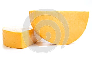 Two Half Wheels of Colby Cheese