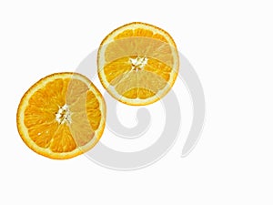 Two halves of a bright orange on a white background. Juicy orange halves on a white background