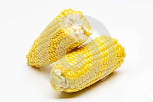 Two halves ear of ripe sweet corn isolated on white background. Isolated. Package design element. Sweet corn without husk