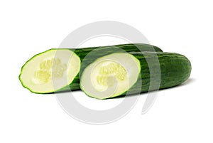 Two halves of a green cucumber isolated on a white background