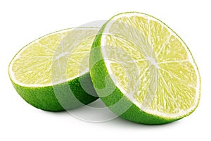 Two halves of green lime citrus fruit on white