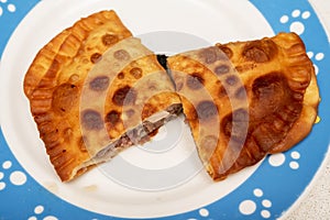 Two halves of meat pie