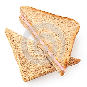Two ham and mustard wholewheat triangle sandwiches from above