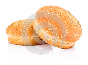 Two hamburger buns with sesame isolated on white background photo