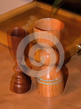 Two Handmade Wooden Chalices in Motion