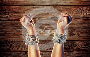 Two hands in chains