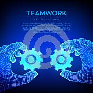 Two hands connect the gears. Symbol of association and connection. Building a business system. Teamwork, cooperation concept.