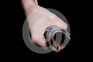 two hands with dollars. Closeup female hand giving money for something with isolated on black background,count, paying, shopping