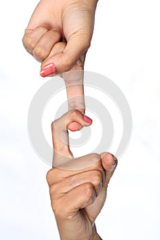 Two hands with fingers linked