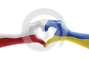 Two hands in the form of heart with Polish and Ukrainian flag isolated on white