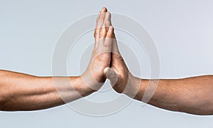 Two hands gestures. Giving high five. Two hands, male and man. High five gesture of man and girl, successful cooperation