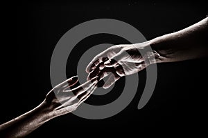 Two hands. Helping hand to a friend. Rescue or helping gesture of hands. Concept of salvation. Hands of two people at