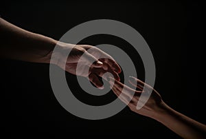 Two hands. Helping hand to a friend. Rescue or helping gesture of hands. Concept of salvation. Hands of two people at