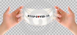 Two hands holding a medical mask. Stop Coranavirus concept background. photo