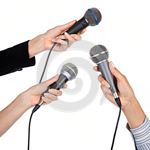 Hands holding microphones