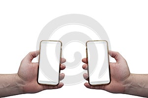 Two hands holding mobile phones on white background with empty screens for montage