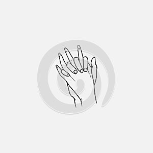 Two hands with interlocked or intertwined fingers hand drawn by black contour lines on white background. Symbol of love photo