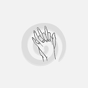 Two hands with interlocked or intertwined fingers hand drawn by black contour lines on white background. Symbol of love photo