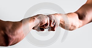 Two hands, isolated arm. Hands of man people fist bump team teamwork, success. Man giving fist bump. Friendly handshake