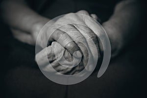 Two hands of an old man