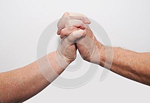 Two hands old together