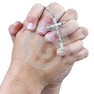 Two hands praying with a small silver crucifix