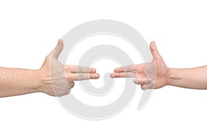 Two hands in the shape of a gun. Isolated white background